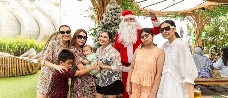 Friends celebrating Christmas at Luna Beer Garden